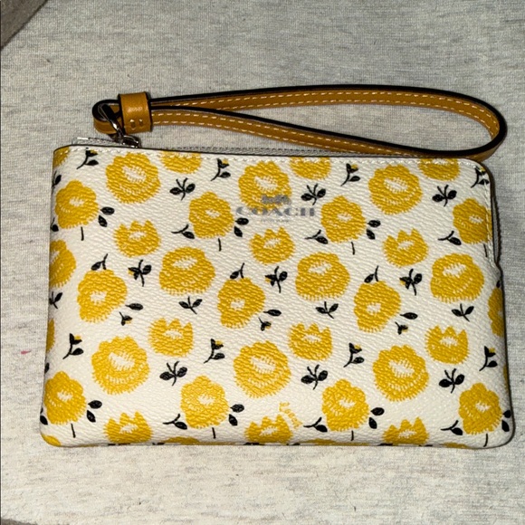 Coach Handbags - Coach Floral Yellow Wristlet